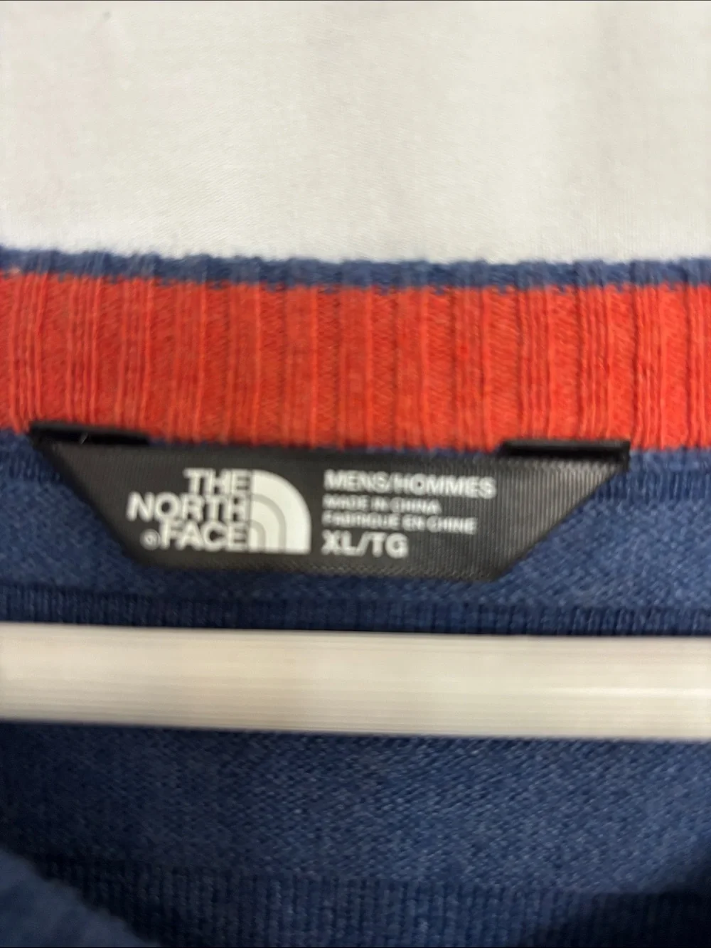 The North Face Blue V-Neck Sweater with Orange Trim